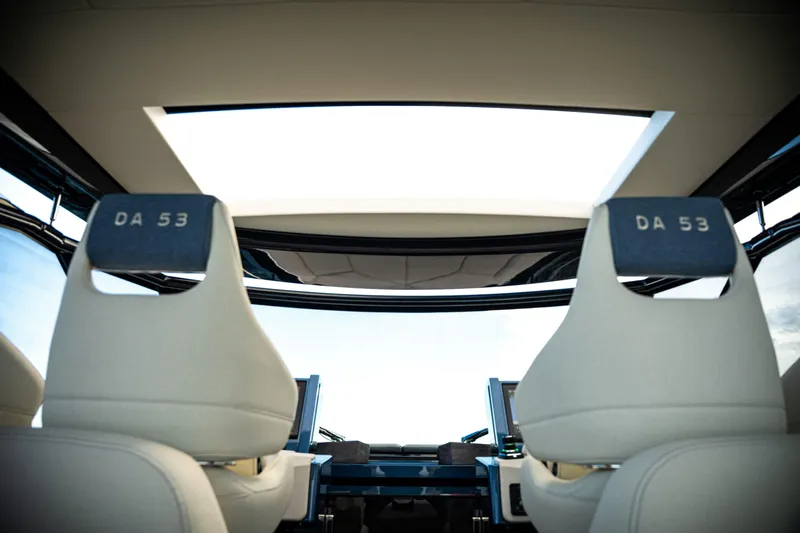  Yacht Photos Pics Interior view of 2025 Dutch American DA 53 with modern seats and panoramic roof.