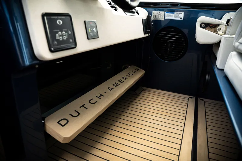  Yacht Photos Pics Interior of 2025 Dutch American DA 53 boat with branded step and control panel.