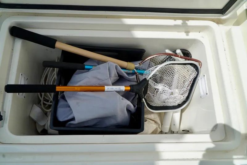  Yacht Photos Pics Storage compartment on 2017 SeaVee 34Z boat with fishing gear and nets.