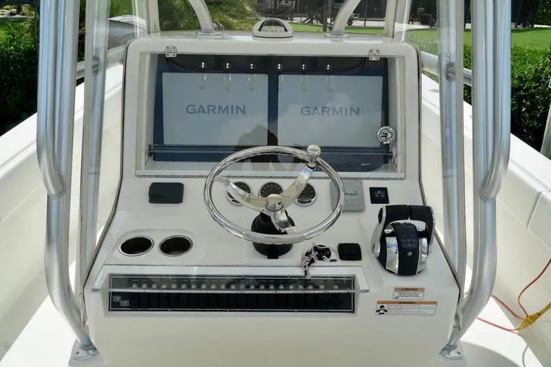  Yacht Photos Pics 2017 SeaVee 34Z boat console with Garmin displays and steering wheel.