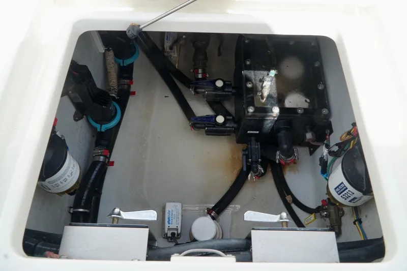  Yacht Photos Pics Engine compartment of a 2017 SeaVee 34Z boat, showing various mechanical components.