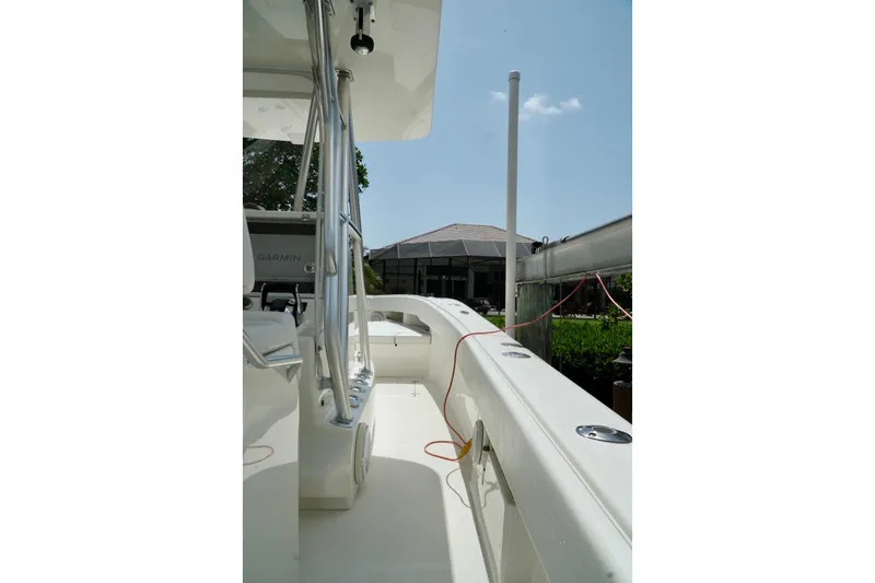  Yacht Photos Pics 2017 SeaVee 34Z boat deck with railing and equipment under clear sky.