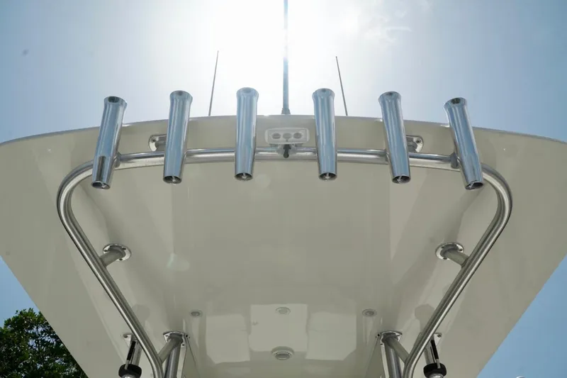  Yacht Photos Pics 2017 SeaVee 34Z boat with stainless steel rod holders under a clear sky.