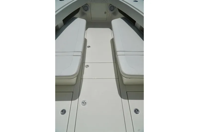  Yacht Photos Pics 2017 SeaVee 34Z boat interior with cushioned seating and storage compartments.