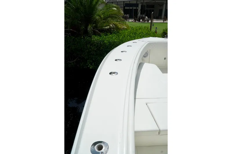  Yacht Photos Pics 2017 SeaVee 34Z boat deck with lush greenery in the background.