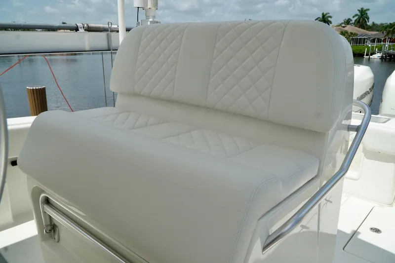  Yacht Photos Pics Luxurious white seating on 2017 SeaVee 34Z boat, featuring quilted upholstery and sleek design.