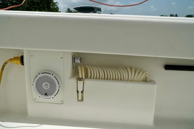  Yacht Photos Pics 2017 SeaVee 34Z boat deck with speaker, hose, and electrical connection.