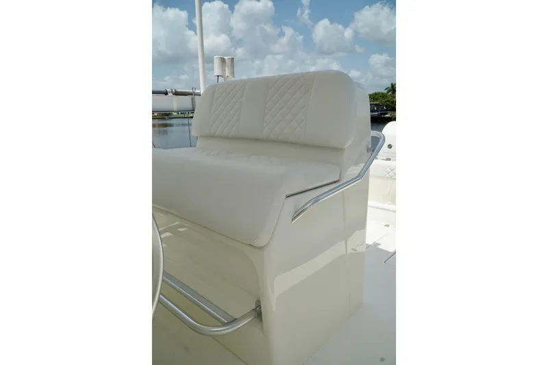  Yacht Photos Pics 2017 SeaVee 34Z boat with white cushioned seating and stainless steel handrails.