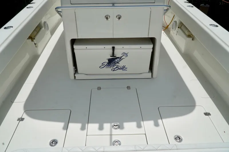  Yacht Photos Pics 2017 SeaVee 34Z boat deck with storage compartments and cooler.