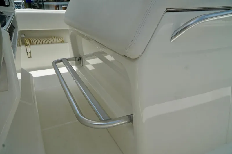  Yacht Photos Pics 2017 SeaVee 34Z boat interior with sleek metal footrest and white seating.