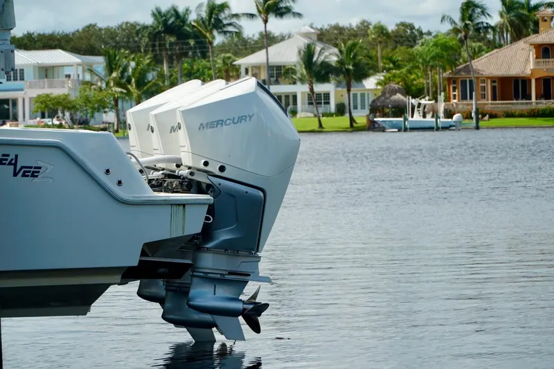  Yacht Photos Pics 2017 SeaVee 34Z boat with Mercury engines on a scenic waterfront.