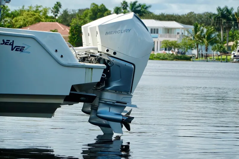  Yacht Photos Pics 2017 SeaVee 34Z boat with Mercury outboard engine on calm water.