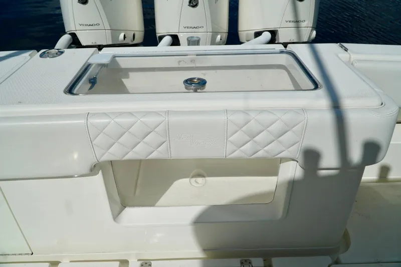 Yacht Photos Pics 2017 SeaVee 34Z boat with white upholstery and triple Verado engines.