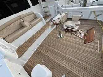 Slabjack Yacht Photos Pics 2017 Viking 55 Convertible yacht deck with seating and fishing chair.