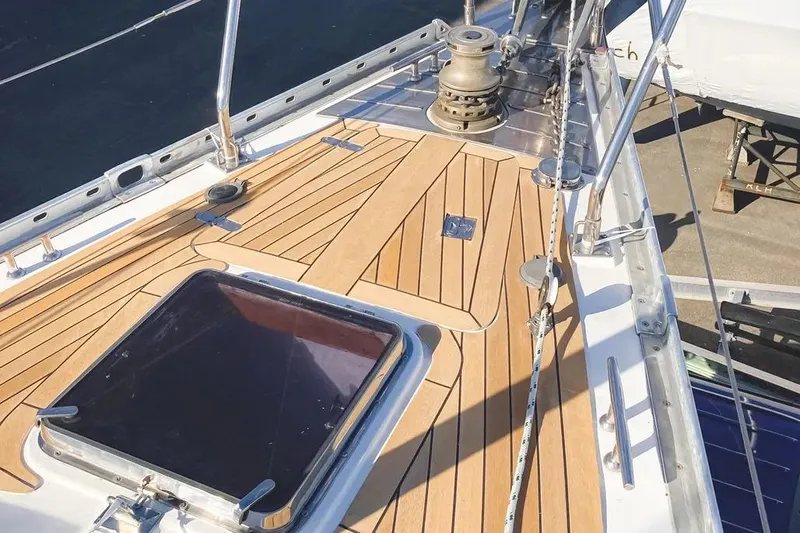 Violina Yacht Photos Pics Deck of a 1999 Hylas 54 yacht with teak finish and winch.