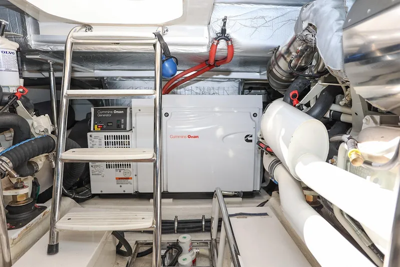  Yacht Photos Pics Engine room of 2016 Riviera 525 SUV with Cummins Onan generator and ladder access.