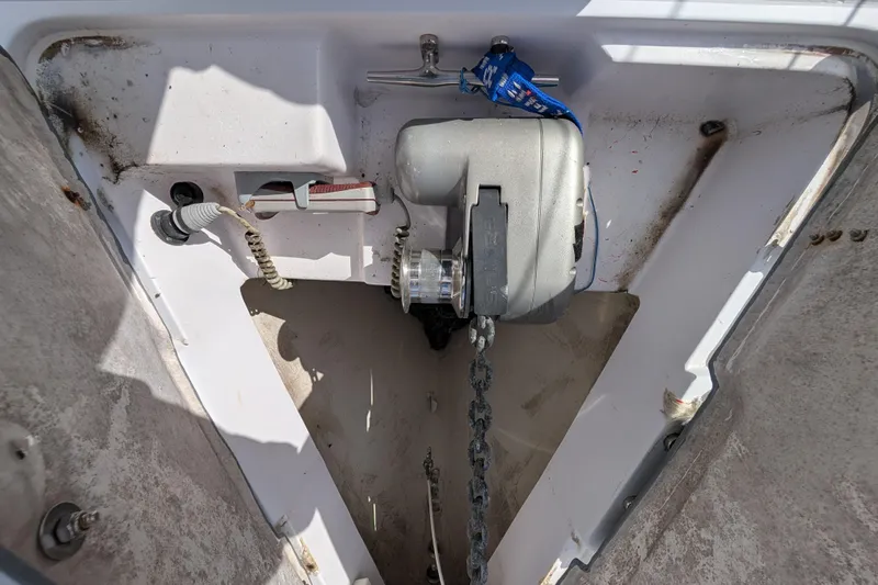 Uno Mas Yacht Photos Pics Anchor locker of 2021 Catalina 315 sailboat with chain and winch.