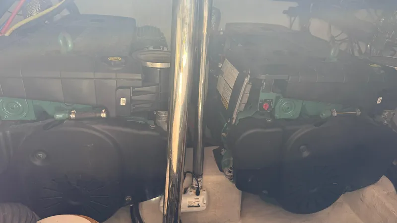  Yacht Photos Pics Engine room of 2022 Evolve 400HT with dual engines and metallic components.