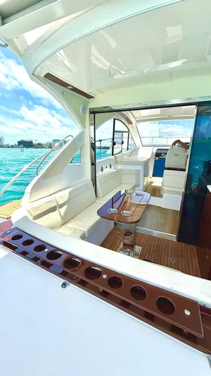  Yacht Photos Pics Luxurious 2022 Evolve 400HT yacht interior with elegant seating and ocean view.