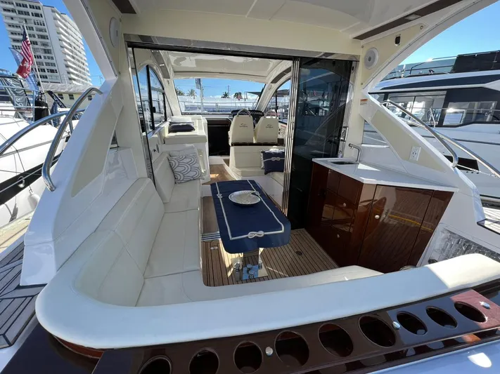  Yacht Photos Pics Luxurious 2022 Evolve 400HT yacht interior with elegant seating and modern amenities.