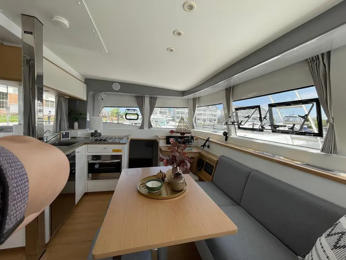Artemis Yacht Photos Pics Interior of 2022 Excess 12 yacht with modern kitchen and dining area.