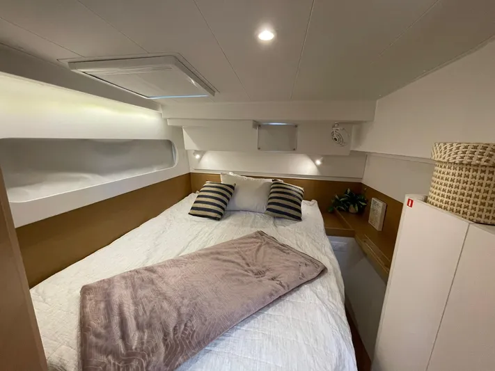 Artemis Yacht Photos Pics Cozy bedroom in 2022 Excess 12 yacht with modern decor and soft lighting.