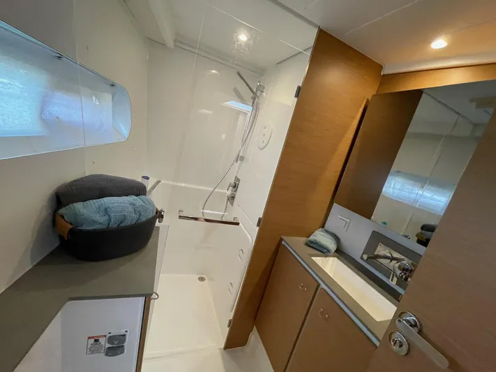 Artemis Yacht Photos Pics Modern bathroom interior on 2022 Excess 12 yacht, featuring shower and sink.