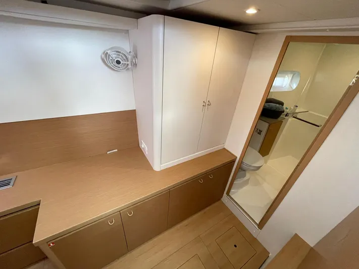 Artemis Yacht Photos Pics Interior of 2022 Excess 12 yacht featuring modern cabinetry and a compact bathroom.