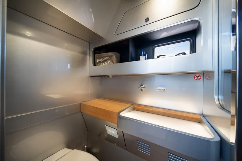 Sea Sea II Yacht Photos Pics Modern bathroom interior of 2022 Novamarine BS 160 Outboard boat, featuring sleek design and storage.