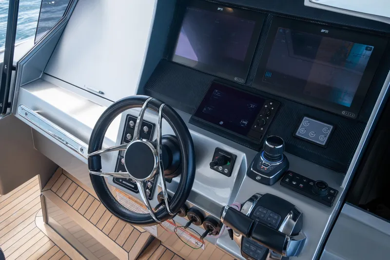 Sea Sea II Yacht Photos Pics Steering console of 2022 Novamarine BS 160 Outboard with modern navigation displays.