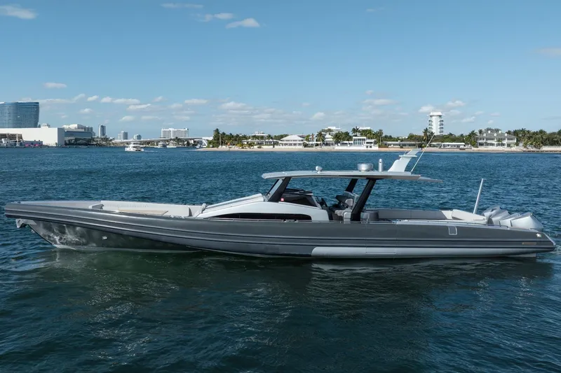 Sea Sea II Yacht Photos Pics 2022 Novamarine BS 160 Outboard boat on calm water, cityscape in background.
