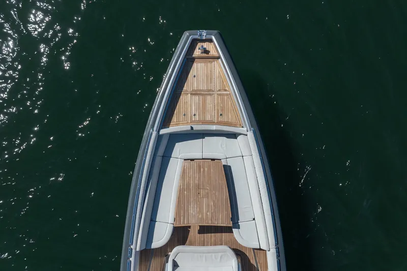Sea Sea II Yacht Photos Pics Top view of 2022 Novamarine BS 160 Outboard boat with wooden deck on water.