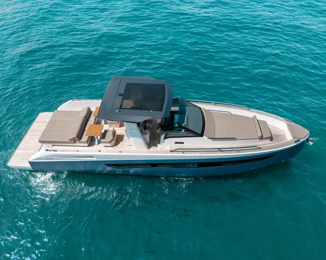  Yacht Photos Pics 2023 Fiart SEAWALKER 43 yacht cruising on clear blue water.