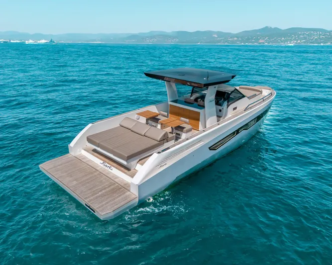  Yacht Photos Pics 2023 Fiart SEAWALKER 43 yacht cruising on clear blue waters.