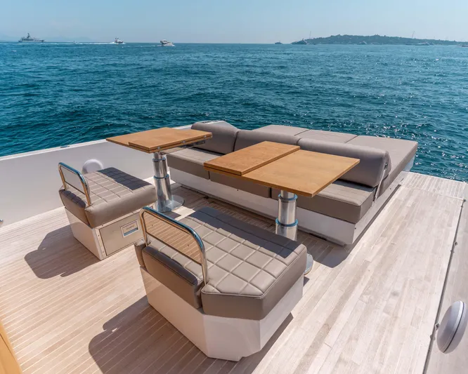  Yacht Photos Pics Luxury seating area on 2023 Fiart SEAWALKER 43 yacht, overlooking serene ocean waters.