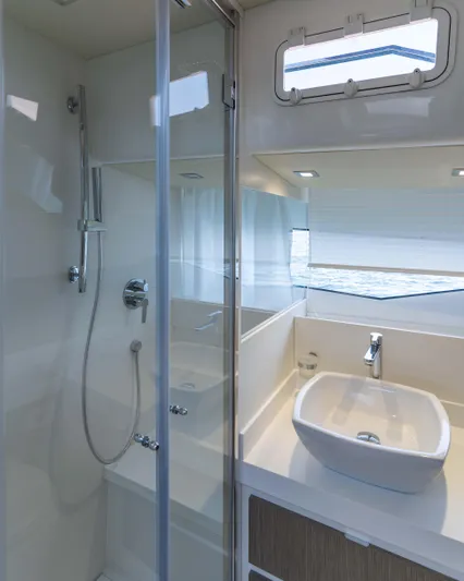  Yacht Photos Pics Modern bathroom in 2023 Fiart SEAWALKER 43 yacht with shower and sink.