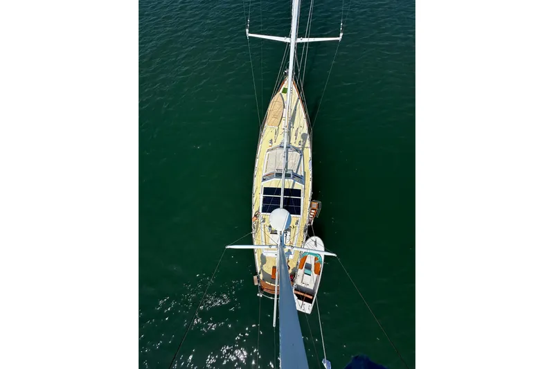 Scout (name Reserved) Yacht Photos Pics Aerial view of 1971 Alden Boothbay Explorer sailboat on calm water.