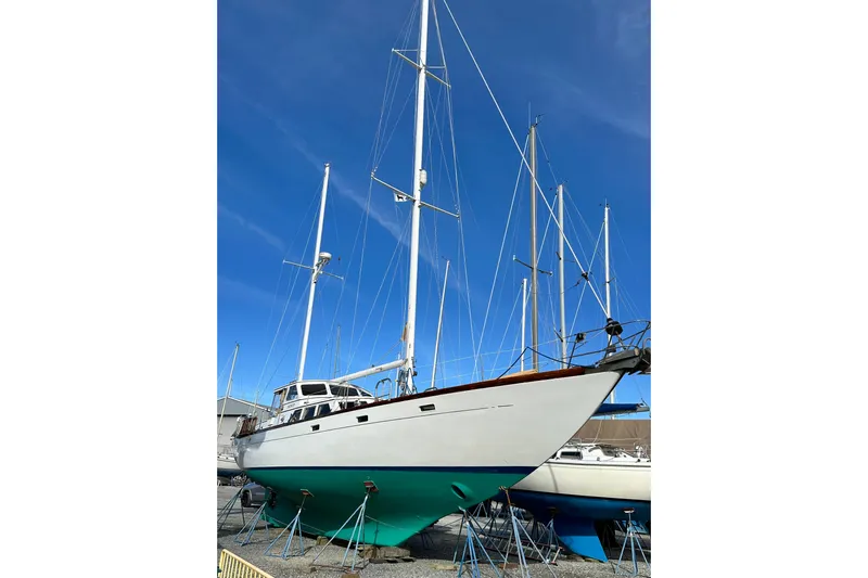 Scout (name Reserved) Yacht Photos Pics 1971 Alden Boothbay Explorer sailboat on stands under clear blue sky.