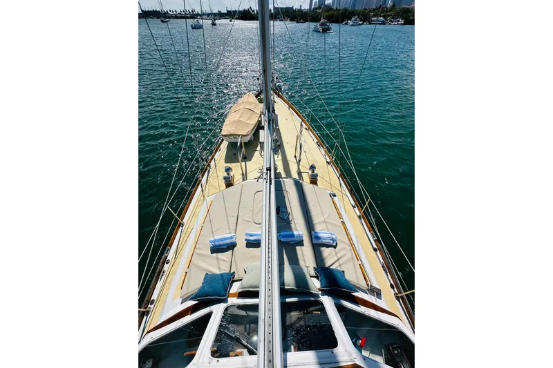 Scout (name Reserved) Yacht Photos Pics Alden Boothbay Explorer 1971 yacht deck with cushions and towels on a sunny day.