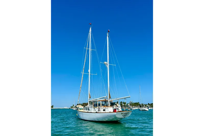 Scout (name Reserved) Yacht Photos Pics 1971 Alden Boothbay Explorer sailboat on blue ocean under clear sky.