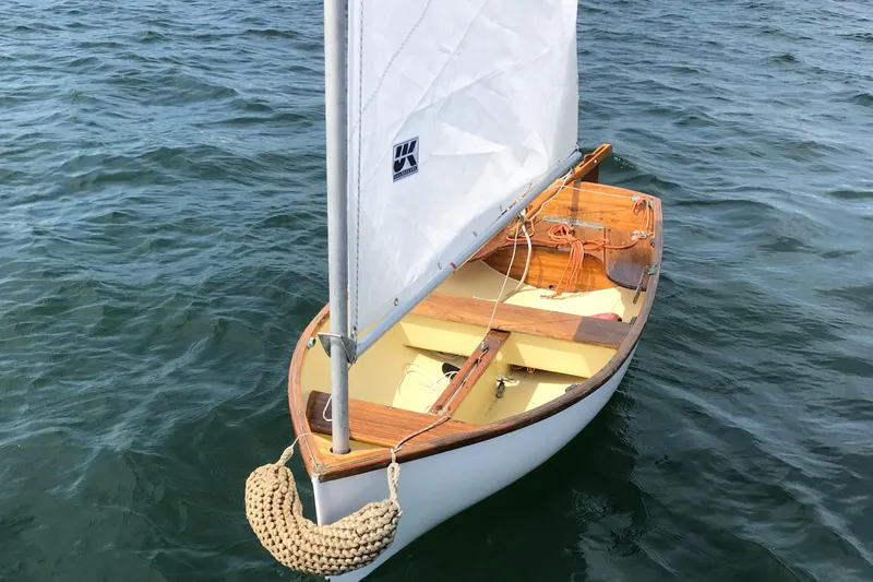 Scout (name Reserved) Yacht Photos Pics 1971 Alden Boothbay Explorer sailboat on calm water, showcasing classic wooden design.