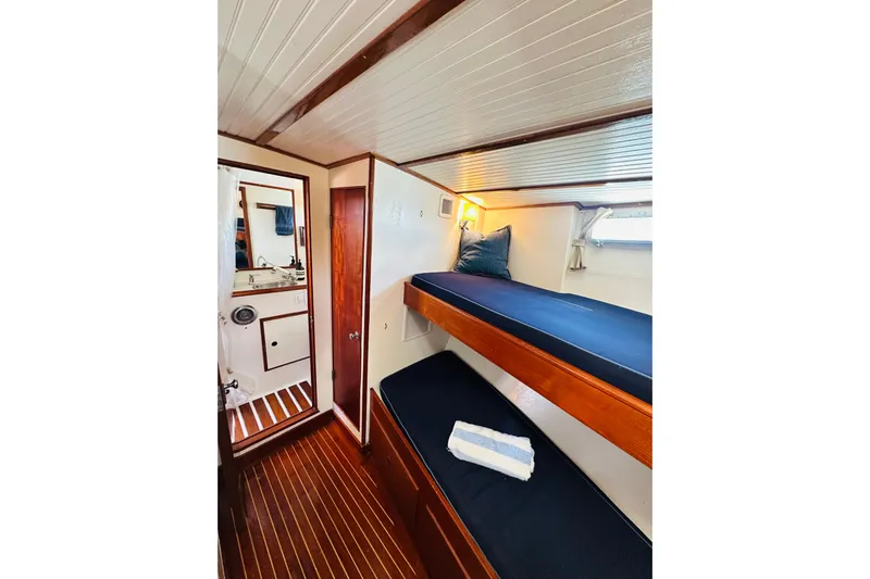 Scout (name Reserved) Yacht Photos Pics 1971 Alden Boothbay Explorer cabin with wooden bunks and nautical decor.