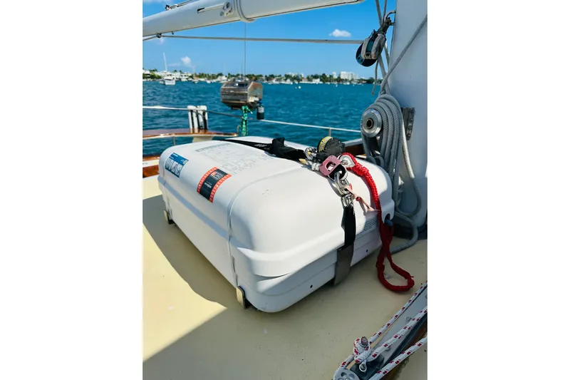 Scout (name Reserved) Yacht Photos Pics 1971 Alden Boothbay Explorer sailboat deck with safety equipment, ocean view in background.