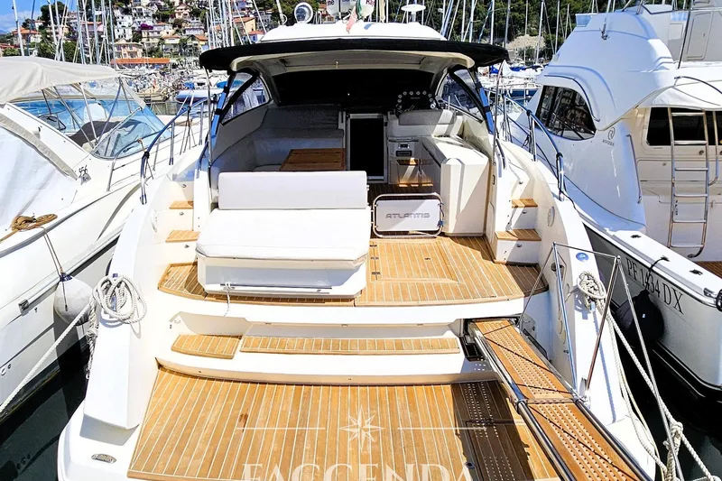  Yacht Photos Pics Luxury Azimut Atlantis 44 yacht, 2013 model, docked in a marina.
