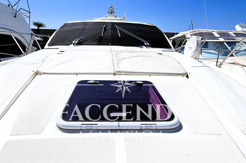  Yacht Photos Pics Azimut Atlantis 44 yacht, 2013 model, docked under clear blue sky.