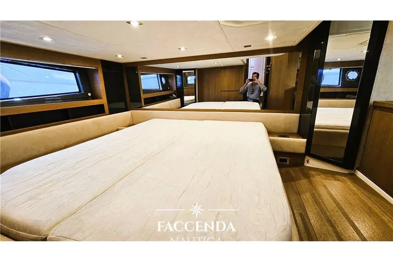  Yacht Photos Pics Luxurious interior of 2013 Azimut Atlantis 44 yacht with spacious bed and modern design.