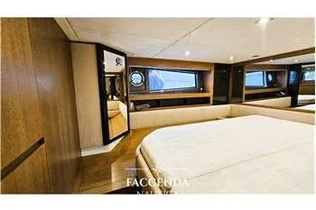  Yacht Photos Pics Luxurious interior of 2013 Azimut Atlantis 44 yacht with elegant wood finishes.