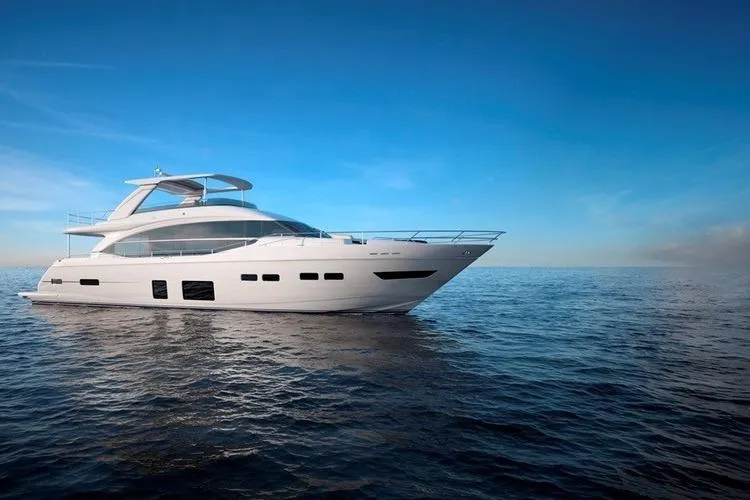  Yacht Photos Pics Luxurious 2016 Princess 75 yacht cruising on open sea under clear blue sky.