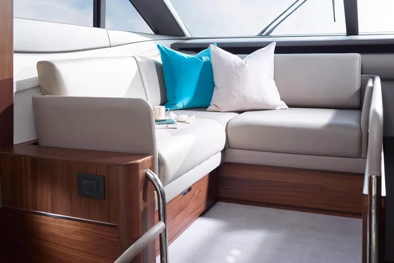  Yacht Photos Pics Luxurious interior of 2016 Princess 75 yacht with elegant seating and cushions.