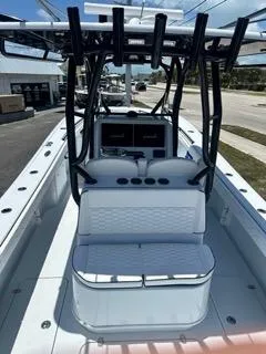  Yacht Photos Pics 2024 Yellowfin 32CC Offshore center console boat with seating and rod holders.